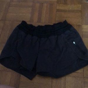 Lululemon black shorts 2inch size four mid waist